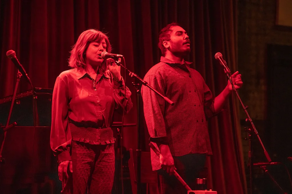 Ritika and Shinjan performing on stage